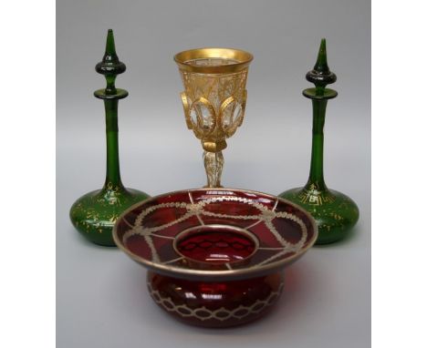 An Edwardian ruby glass spittoon form vase with tooled silver elctrotyped overlay. Together with a gilt Bohemian clear glass 