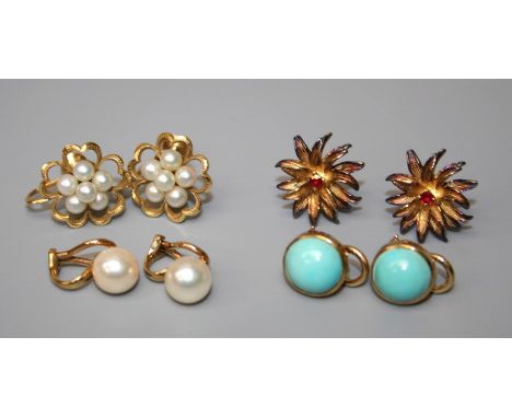 A pair of cultured pearl cluster earrings with screw backs, a pair of single stone ruby flower head earrings, a pair of Mikim