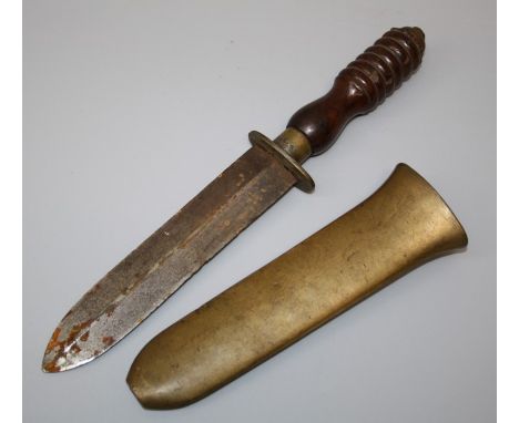 A Siebe Gorman type diver's knife with turned lignum handle and brass scabbard. Blade length 19 cms.