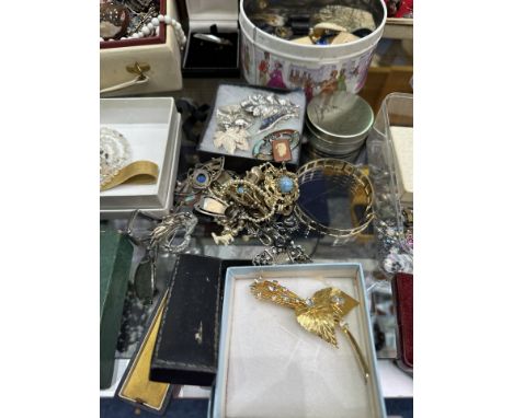 Large Quantity of Vintage Costume Jewellery, some silver pieces, including brooches, earrings, chains, pendants, pearls, neck