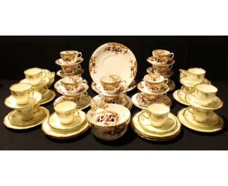 A Royal Albert floral printed tea set for six; a Royal Doulton Salisbury pattern tea set; a Royal Crown Derby Posie pattern p