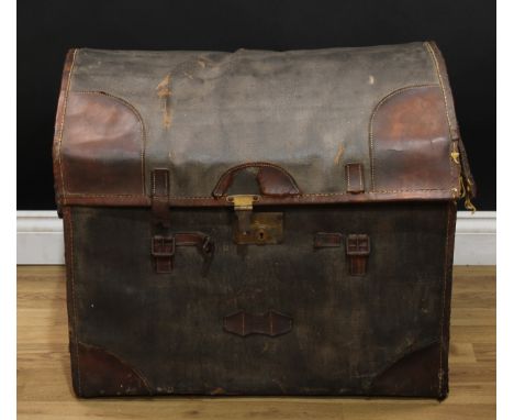 A 19th century leather and canvas coaching trunk, hinged cover enclosing a lift-out tray, carry handles to sides, 61cm high, 