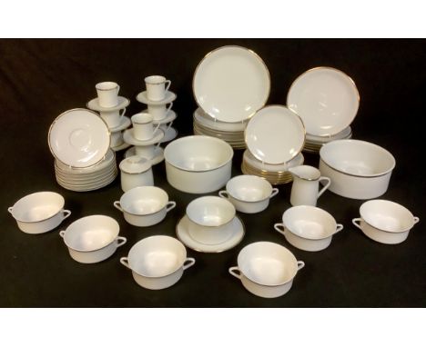 A Thomas Jonelle dinner service comprising dinner plates, side plates, soup bowls and stands, coffee cans and saucers, etc, q