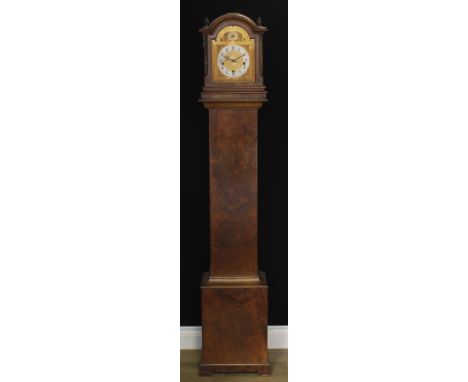 An early 20th century walnut musical hall clock, 19cm arched brass dial with silvered chapter ring inscribed with Arabic nume