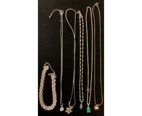 A sterling silver bracelet, marked 925; a silver heart shaped pendant, marked 925; a silver necklace with jade pendant, marke