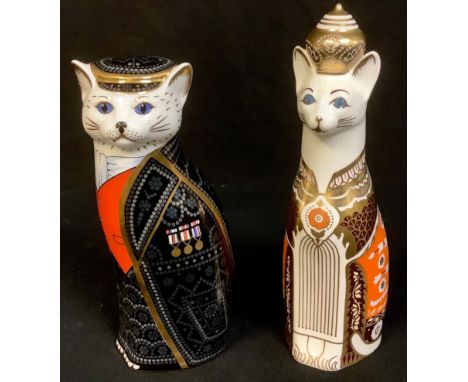 A Royal Crown Derby model, Royal Cats Siamese, 21.5cm, printed mark second quality; another, Pearly King Mile End, 20cm, prin