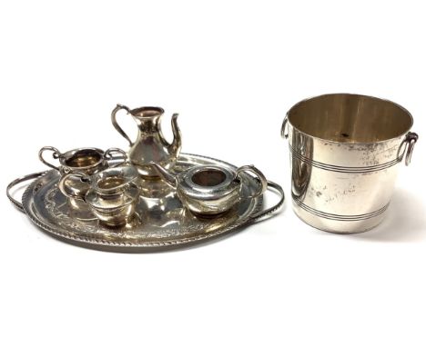 A silver miniature tea service and tray; a silver miniature ice bucket (6) 
