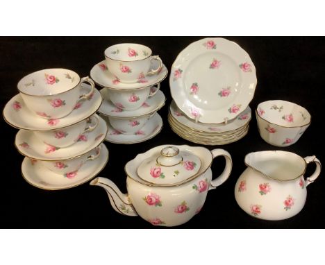 A Royal Crown Derby tea set printed with pink rosebuds, pattern number 4202, comprising bachelor's size teapot, milk jug and 