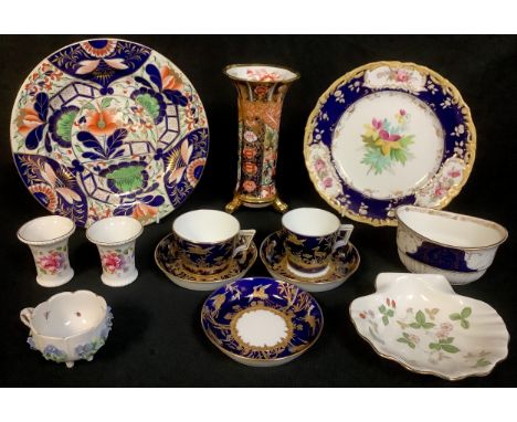 A 19th century minton teacup, coffee cup and three saucers; a Copeland Spode Imari palette vase; a German porcelain floral en