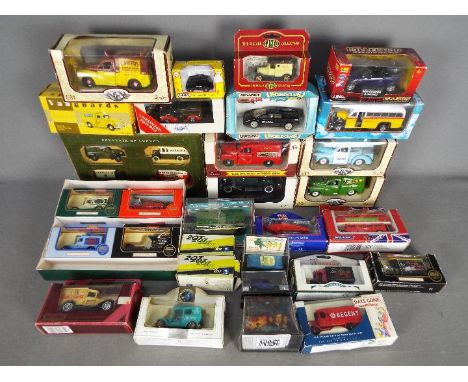 Vanguards, Saico, Matchbox, Classix, Others - Over 20 boxed diecast vehicles in various scales. Lot includes Matchbox 'World 