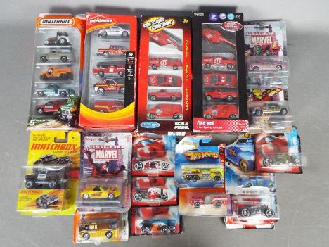 Matchbox, Welly, Majorette, Hot Wheels, Maisto - A collection of four multi-packs and a quantity of carded 1:64 diecast model