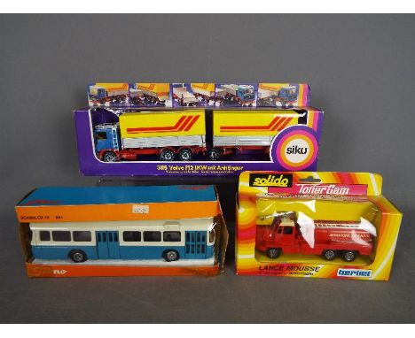 Tekno, Solido, Siku - Three European boxed diecast vehicles in various scales. Lot includes Tekno #851 Scania CR76 bus; Solid