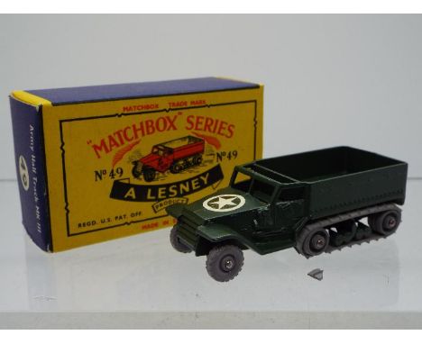 Matchbox - A boxed Matchbox #49 Army Half Track MkIII (M3 Personel Carrier) The model in green with white bonnet star has gre