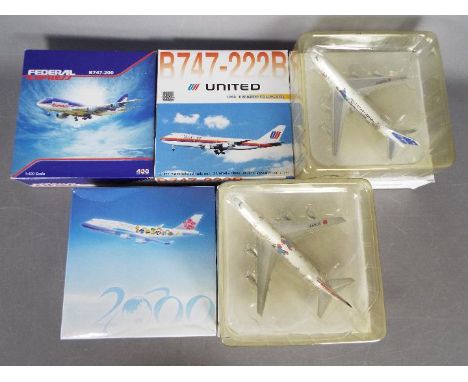 Dragon Wings, Unbranded Maker - Five boxed diecast 1:400 scale model Boeing 747 aircraft in various carrier liveries. Lot inc