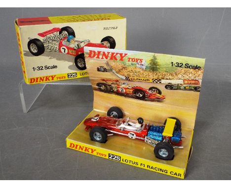 Dinky Toys - A boxed Dinky #225 1:32 scale Lotus F1 Racing Car. The model in metallic red, with blue engine, RN7 label, yello