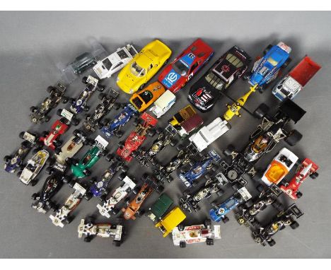 Corgi - Bburago - Lledo. A collection of over 40 loose diecast vehicles in various scales including Bburago Ferrari 250LM, Co