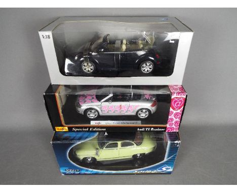 Gate, Maisto, Solido - Three boxed 1:18 scale diecast model cars. Lot includes Gate VW New Beetle (possible Dealer Model); Ma