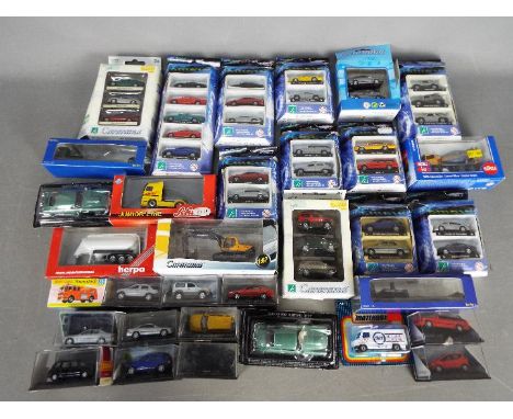 Cararama, Base Toys, Matchbox, Siku, Others - Over 30 boxed diecast vehicles predominately by Cararama. Lot includes Cararama