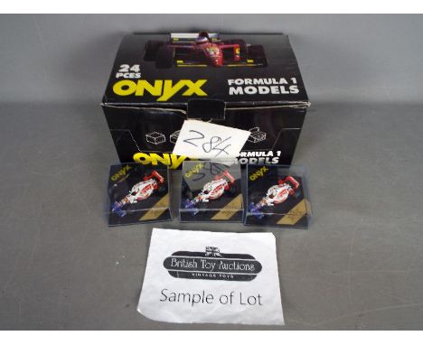 Onyx - A trade box of 24 diecast 1:43 scale diecast F1 racing cars. The box contains 24 examples of #284 Arrows Hart FA17 'Ri