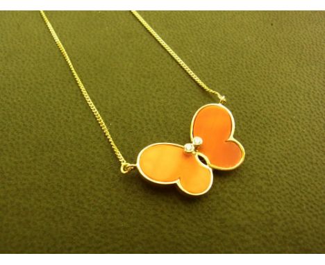 A coral and diamond butterfly necklace - Stamped 585 - Length 36cms - Weight approx 2.9gms
Condition Report: Good - Untested 