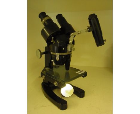 A Cooke Troughton and Simms Ltd Binocular microscope - M603791 with lamp attachment 