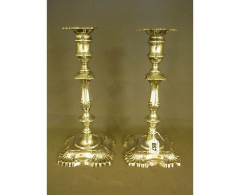 A good pair of early 20th century Queen Anne style silver candlesticks - Hallmarked London 1908 -09 - maker W. Hutton & Son L