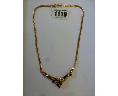 An 18ct yellow gold sapphire and diamond grape and vine design necklace approx weight 19.8 grams