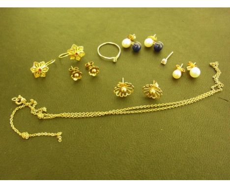 An assortment of jewellery - To include a diamond ear stud - a diamond set ring - gem and cultured pearl earrings and a belch