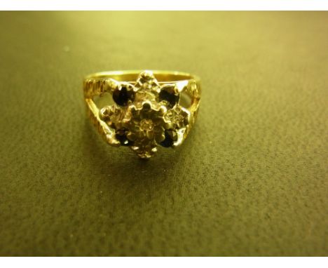 A 9ct gold diamond and sapphire cluster ring - Hallmarked London - Ring size K - Weight approx 3.5 gms
Condition Report: Good