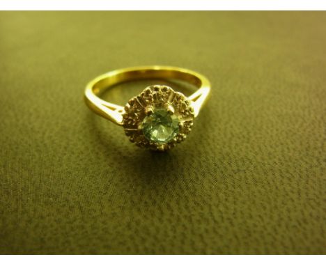 An 18ct gold zircon and diamond cluster ring - Hallmarked London - Ring size O - Weight approx 3.8gms
Condition Report: Good 