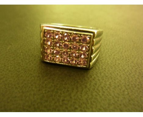 An 18ct gold pink sapphire panel ring - Hallmarked Birmingham - Ring size T - Weight approx 11.6gms
Condition Report: Good