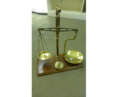A set of brass and mahogany brass balance scales and weights - signed Hunt & Co 