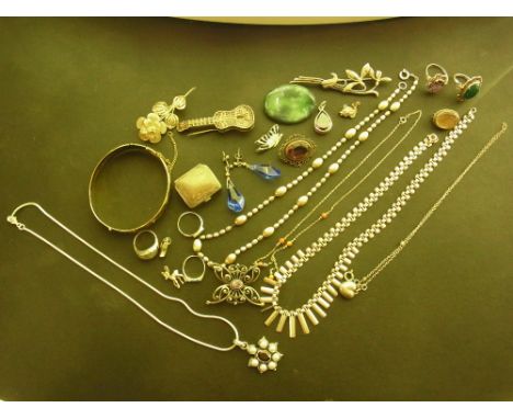 An assortment of silver and costume jewellery - To include a hinged bangle and an amethyst ring - Total weight approx 188gms
