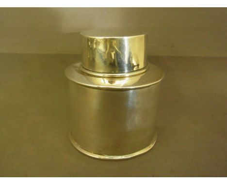 A cylindrical silver tea caddy bearing  the hallmarks for Birmingham 1906 - makers mark W.N. - probably William Neal - Weight