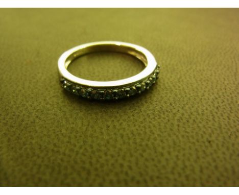 A 9ct gold blue diamond eleven-stone band ring - Hallmarked Birmingham - Ring size N - Weight approx 2.6gms
Condition Report: