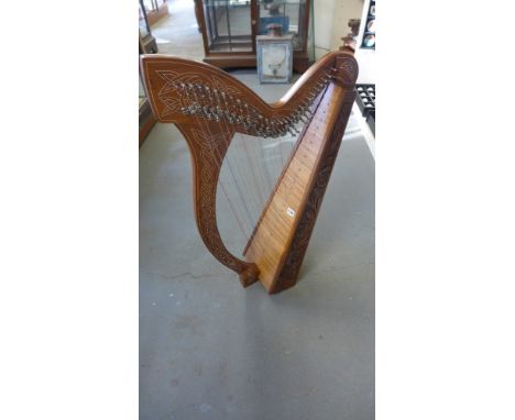 A modern 29 string hardwood Harp - Height 95 cm and padded carry case