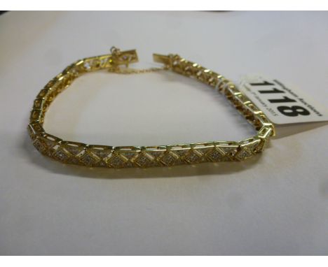 A 9ct gold and diamond illusion set bracelet approx weight 10.9 grams - missing one stone