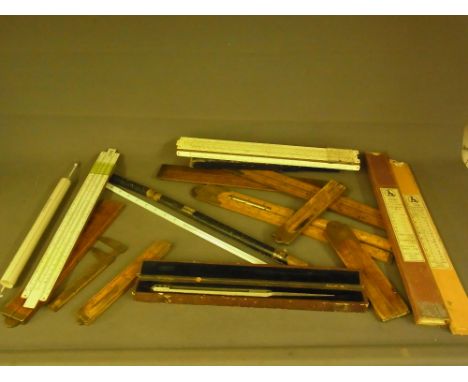 A J Rabone boxwood yard stick with a level, a selection of other measures,  thermometer, slide rules etc. 