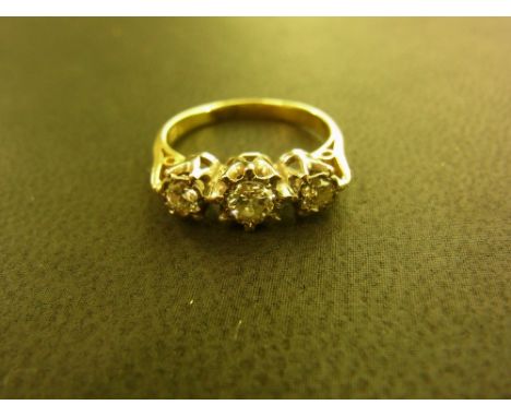 A diamond three stone diamond ring - The single-cut diamonds to the plain band - Tests as gold - Ring size I - Weight approx 