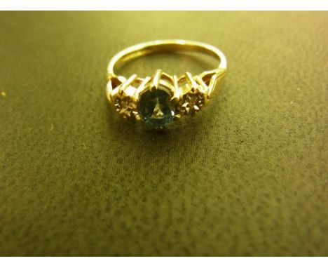 A 9ct gold diamond and topaz three-stone ring - Hallmarked Birmingham -  Ring size I Weight approx 1.5 gms
Condition Report: 