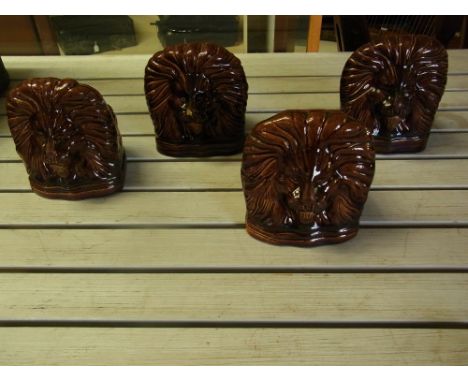 A set of four Victorian treacle glazed lion sash window steps 
Condition report: Some chips