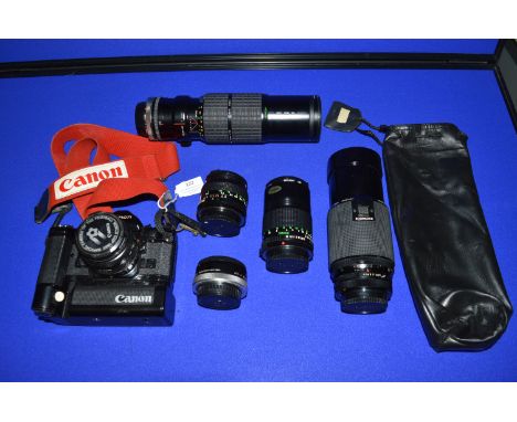 Canon A-1 Motorised 35mm Film Camera (AF) plus Sigma Zoom Kinon Zoom/Macro Lens, and Three Canon Lenses 