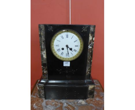 A 19th Century French Belge noir and marble mantel clock
