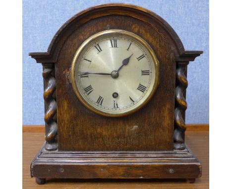 An Astral oak mantel clock
