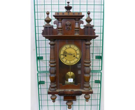 A 19th Century beech Vienna wall clock