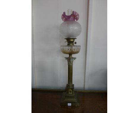 A Victorian brass Corinthian column oil lamp