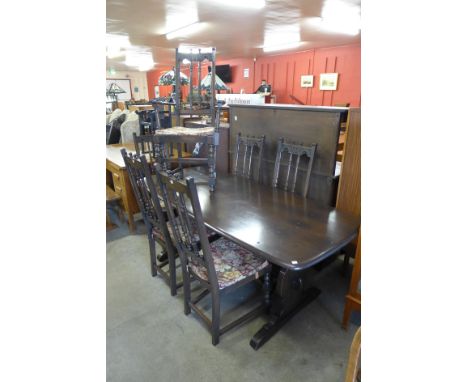 An Ercol refectory table and six chairs