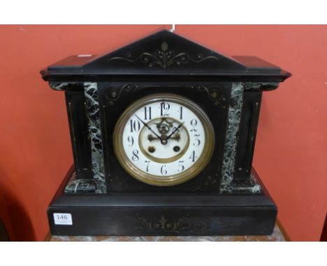 A 19th Century French Belge noir and marble mantel clock