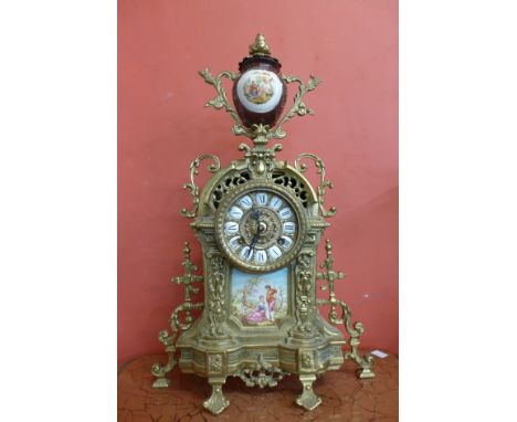 A French style gilt metal and porcelain mantel clock