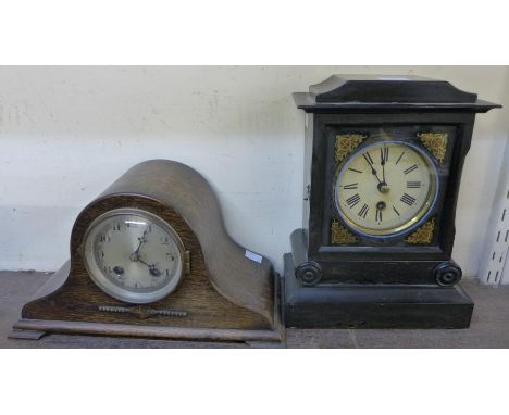 A Badenia Clock Manufactory ebonised timepiece and an oak mantel clock